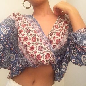 Floral flounce wrap blouse
